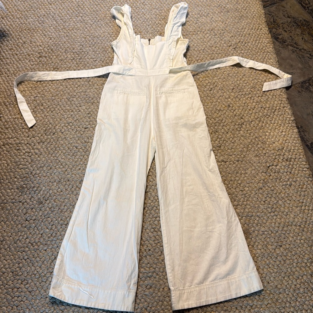 Free people jumpsuit sleeveless waist tie frill sleeve zipper back